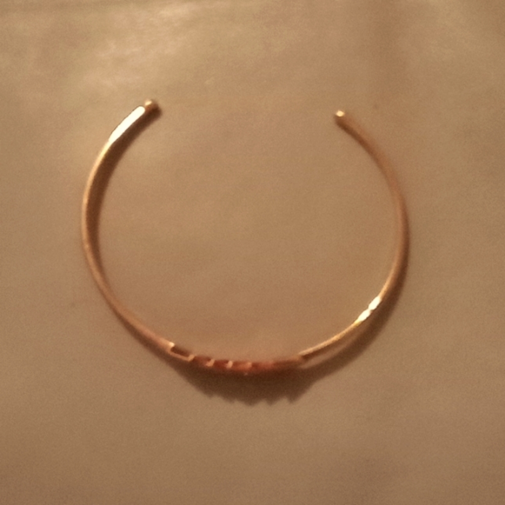 Rose gold and cubic zirconia bangle